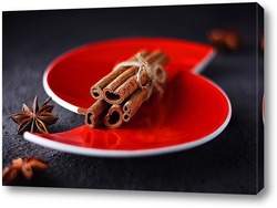  Картина Корица и анис на красной расколотой тарелке.