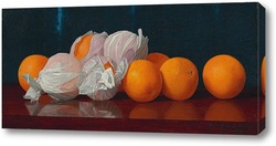    Завернутые апельсины на столешнице