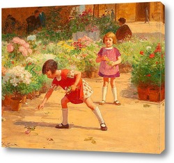    Двое детей собирают цветы