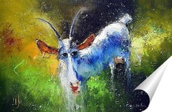  Белая коза в саду ест молодую сочную траву, разводит коз