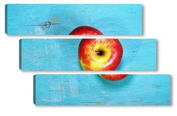 Модульная картина яблоко на голубой деревянной поверхности