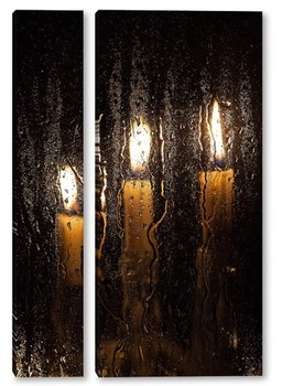 Модульная картина Свечи за мокрым стеклом.